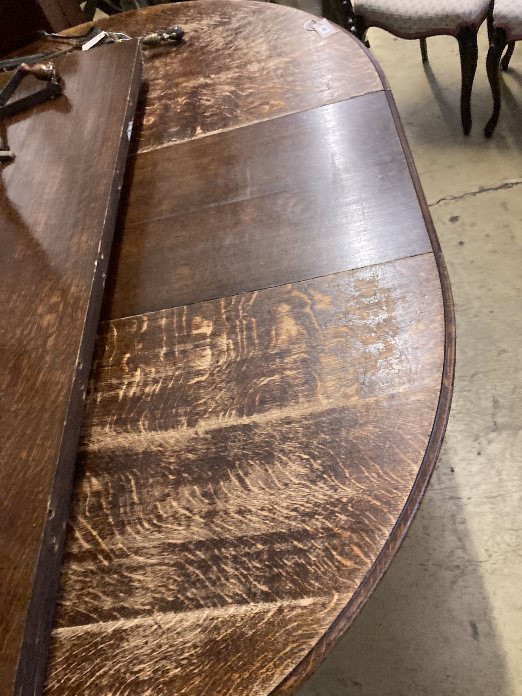 A Victorian oak extending dining table, length 320cm extended (five spare leaves), width 140cm, height 76cm